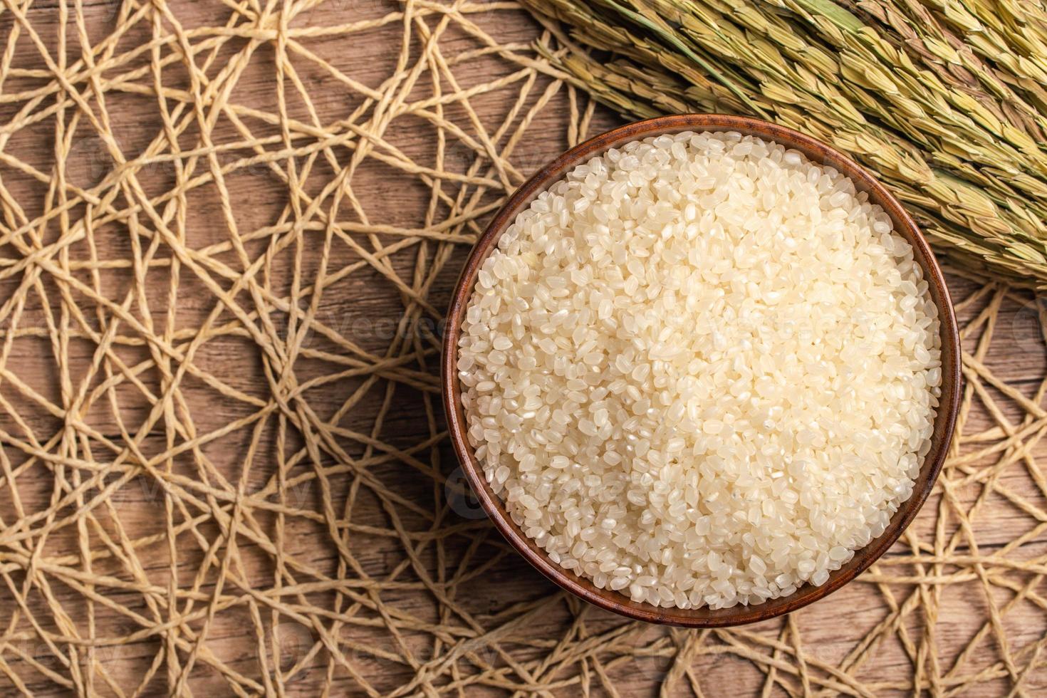 White rice, Masu and ears of rice on a white background photo