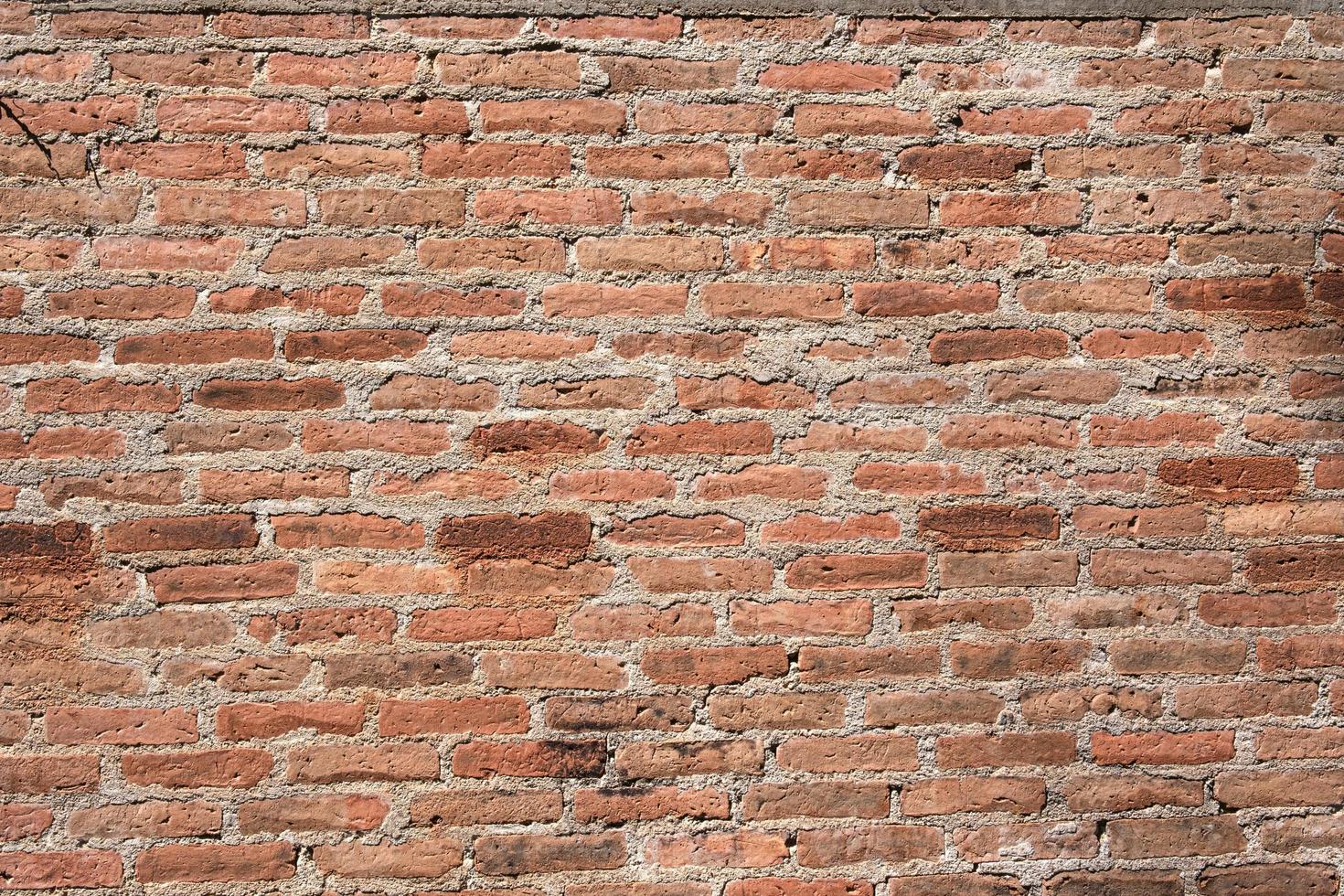 abstract orange square brick block on cement wall textured and background. strong interiors house building image photo