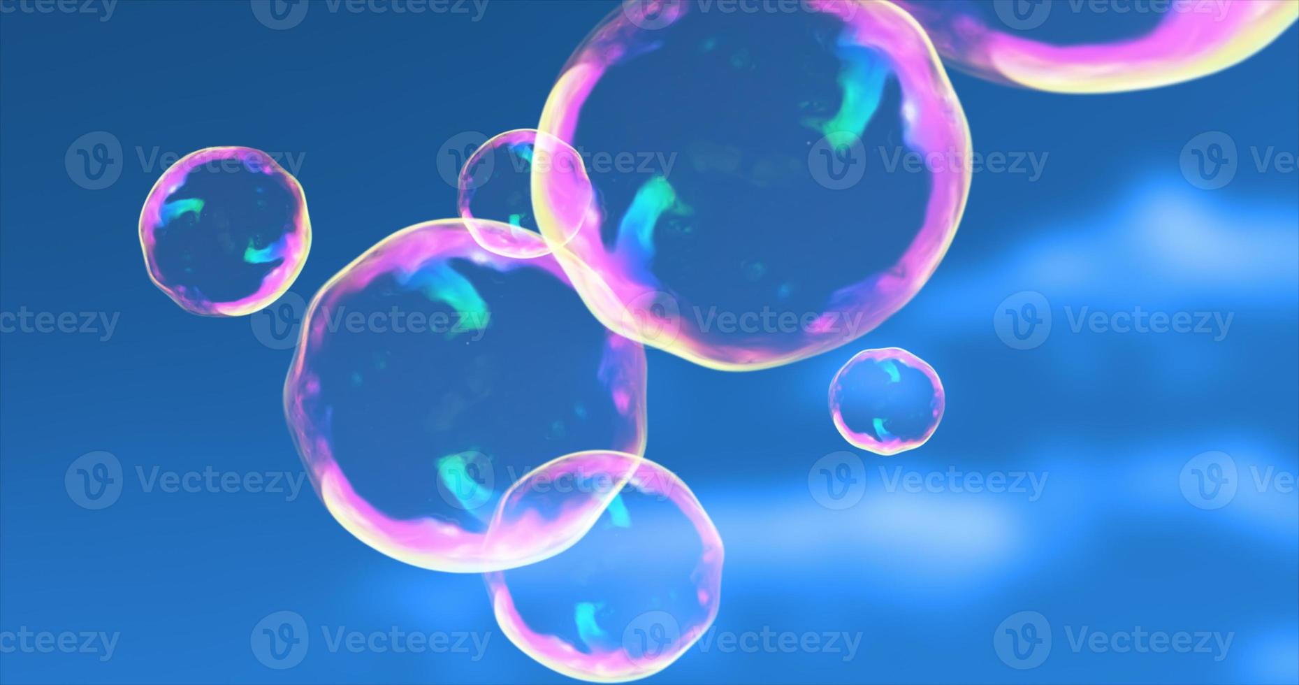 Abstract transparent soap bubbles flying up bright iridescent beautiful festive against the blue sky. Abstract background photo