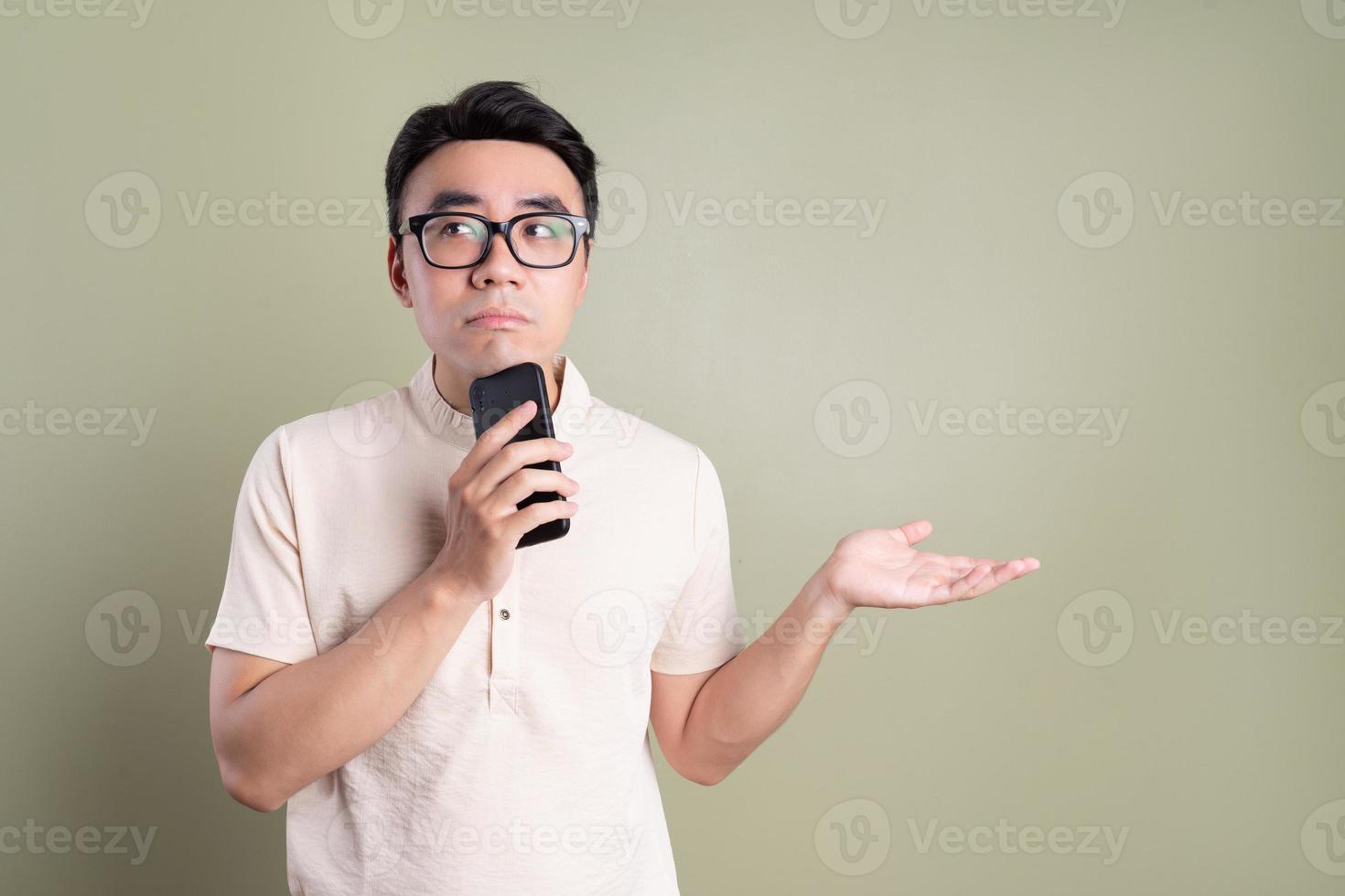 Photo of young Asian man on background