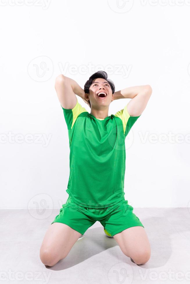 Image of young Asian football player photo