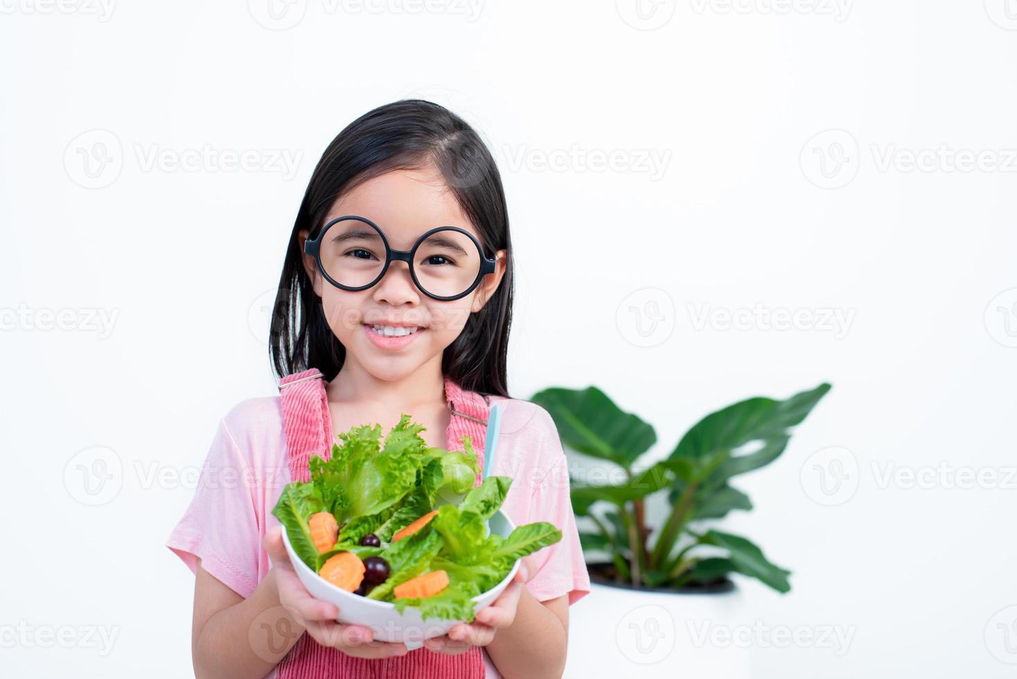 children girl asia eating vegetables photo