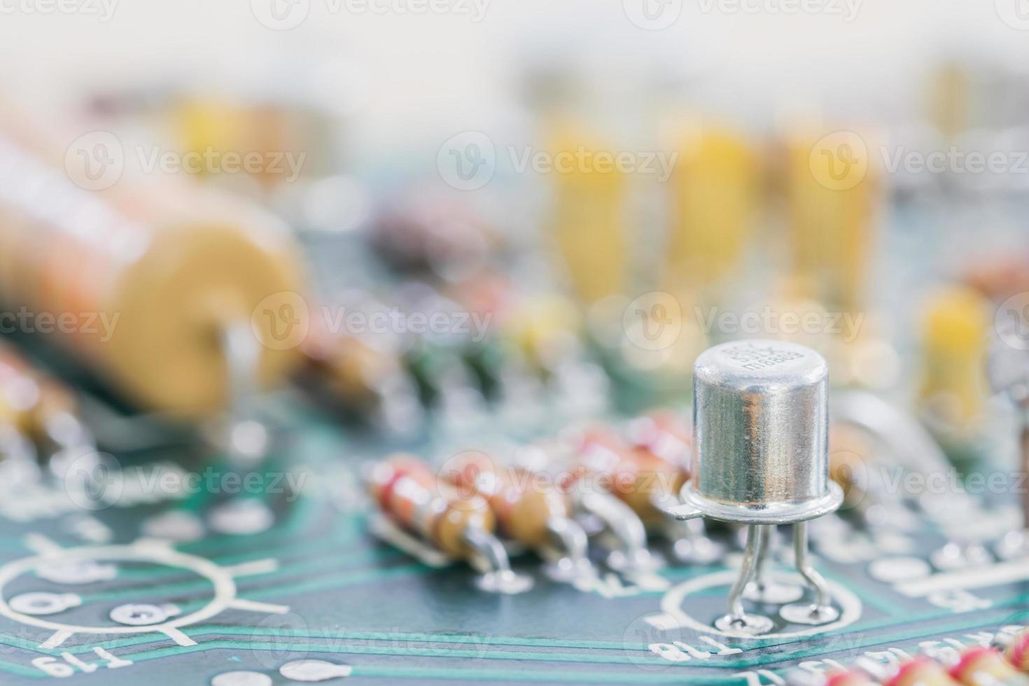Condensers and Resistor assembly on the circuit board photo