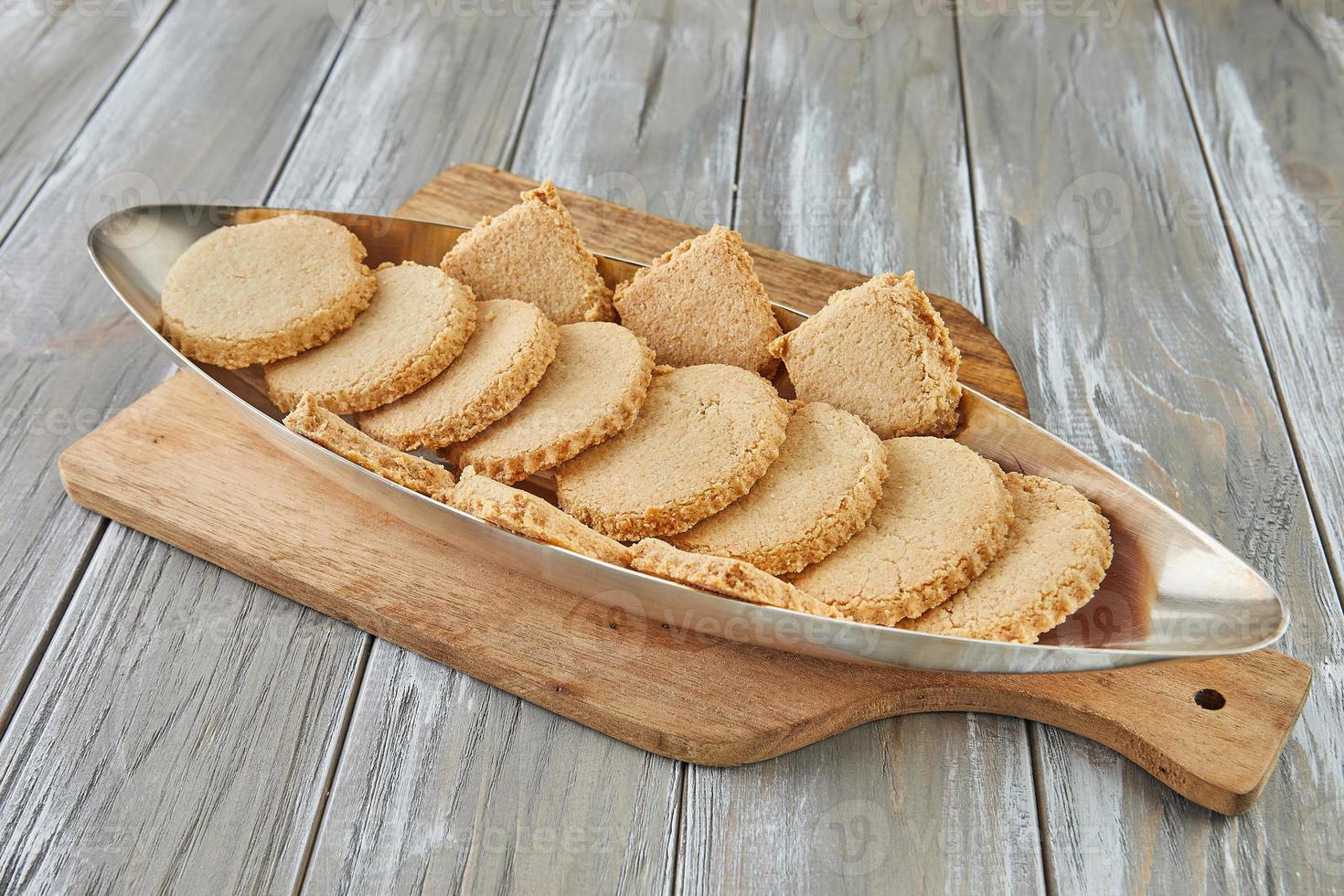 Kosher almond cookies for Passover on wooden background photo