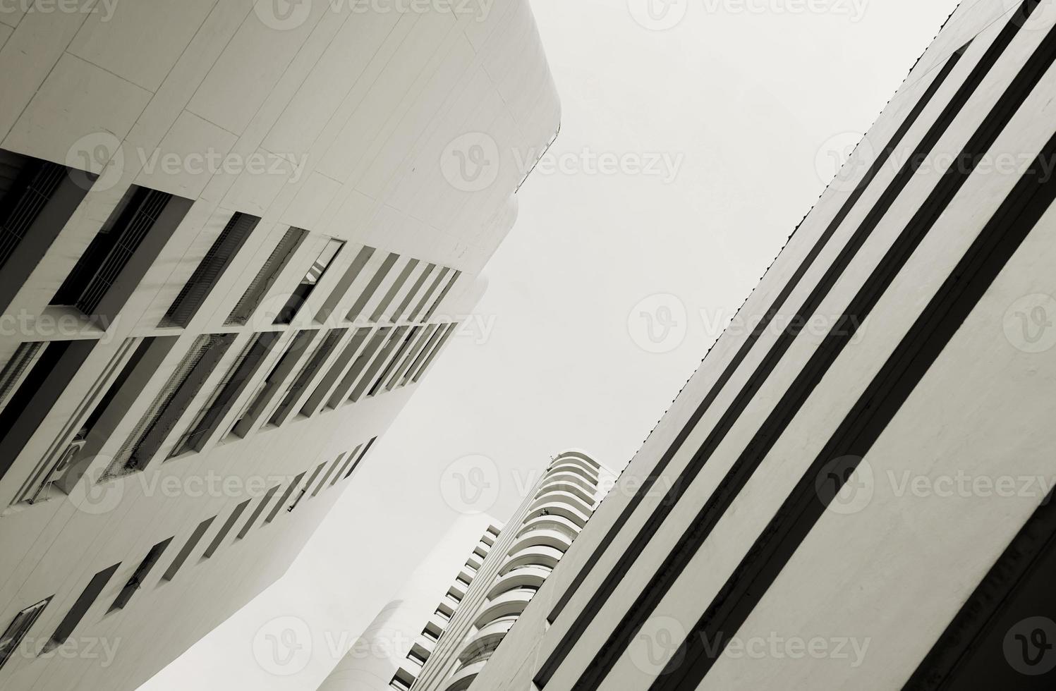 Urban condo, modern flat cosmopolitan residential white marble colors buildings structure skyline background. photo
