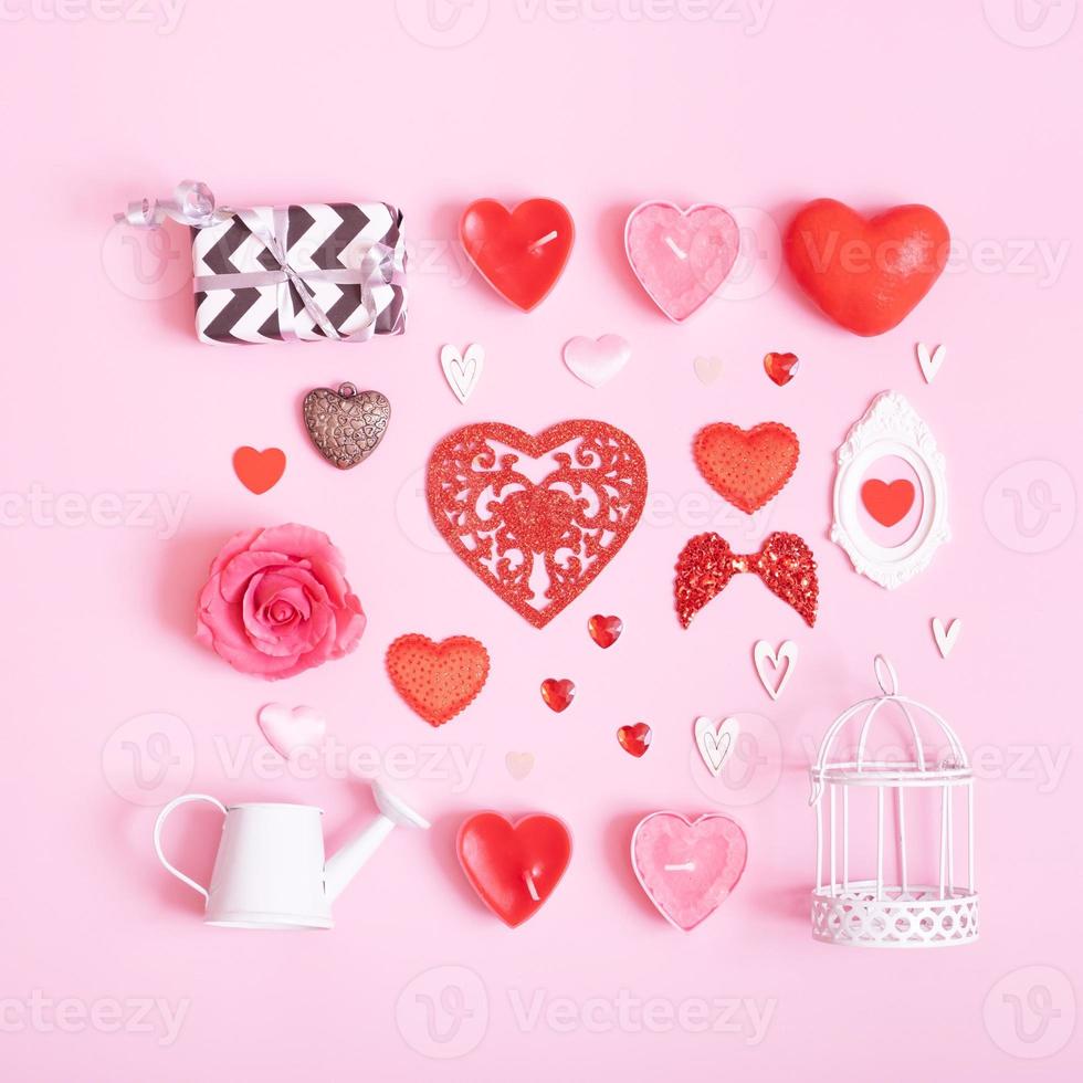 Many differente hearts and valentines day symbols elements top view. Creative valentines day flat lay background photo