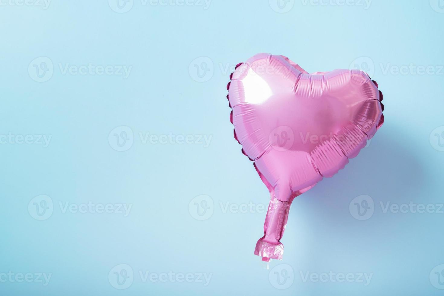 Air balloon heart shape mock up on blue background. Valentines day decorations photo