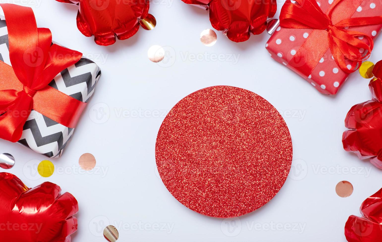 Valentines day podium decoration for cosmetics products flat lay, top view.  Gifts and heart shape balloons photo
