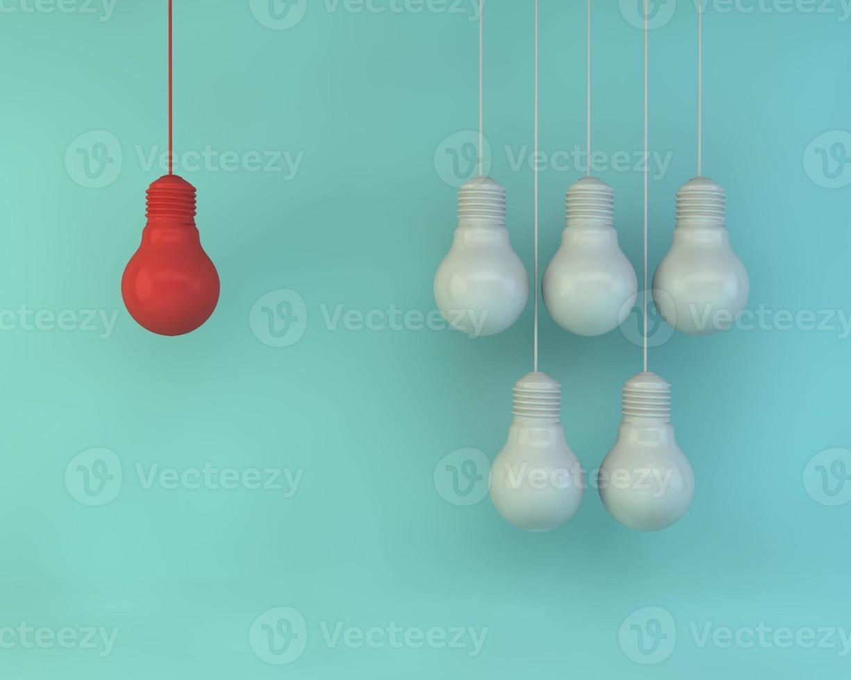 A red light bulb surrounded by white light bulbs on a pastel background photo