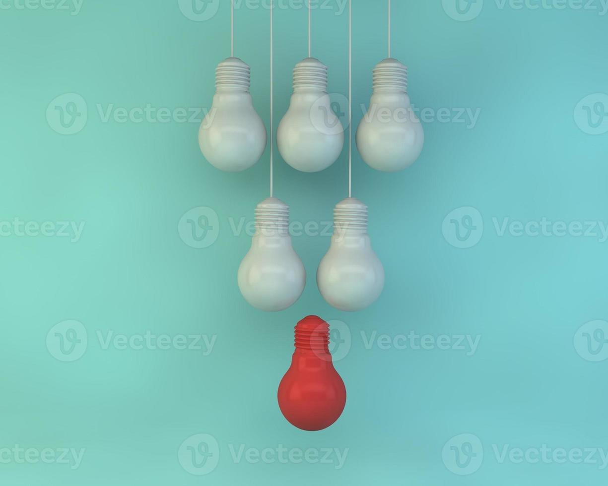 A red light bulb surrounded by white light bulbs on a pastel background photo