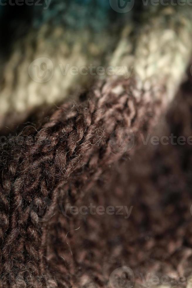 Colorful handmade winter traditional scarf with alpacas wool close up background modern high quality print photo