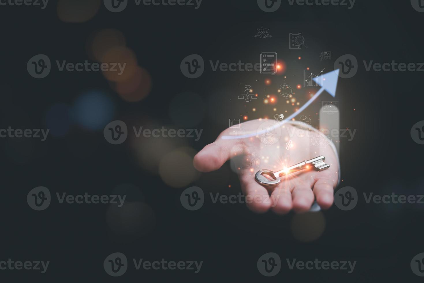 solution concept and demonstrating leadership strategies,that lead the business in a successful direction,with innovation and brain power from brainstorming,key to success in the hands of businessman photo
