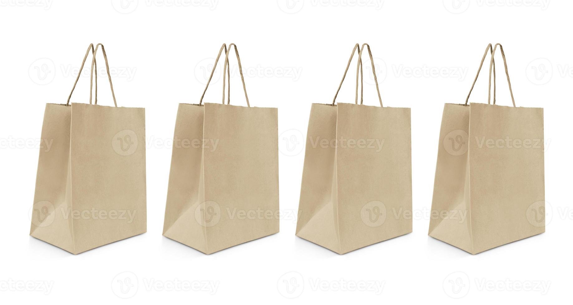 folded paper bag with handles isolated on white background photo