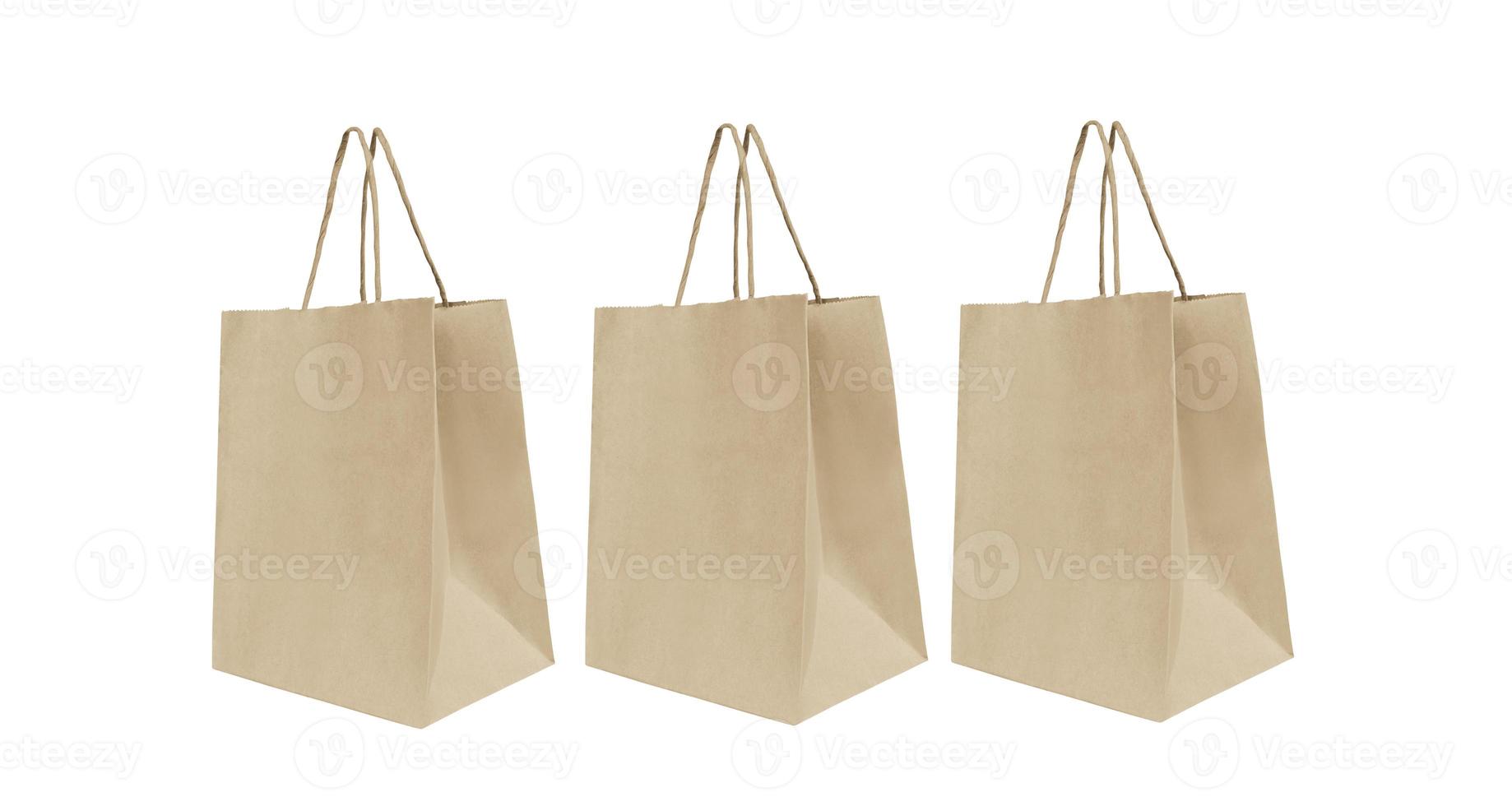 folded paper bag with handles isolated on white background photo