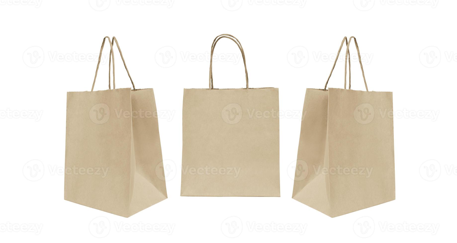 folded paper bag with handles isolated on white background photo