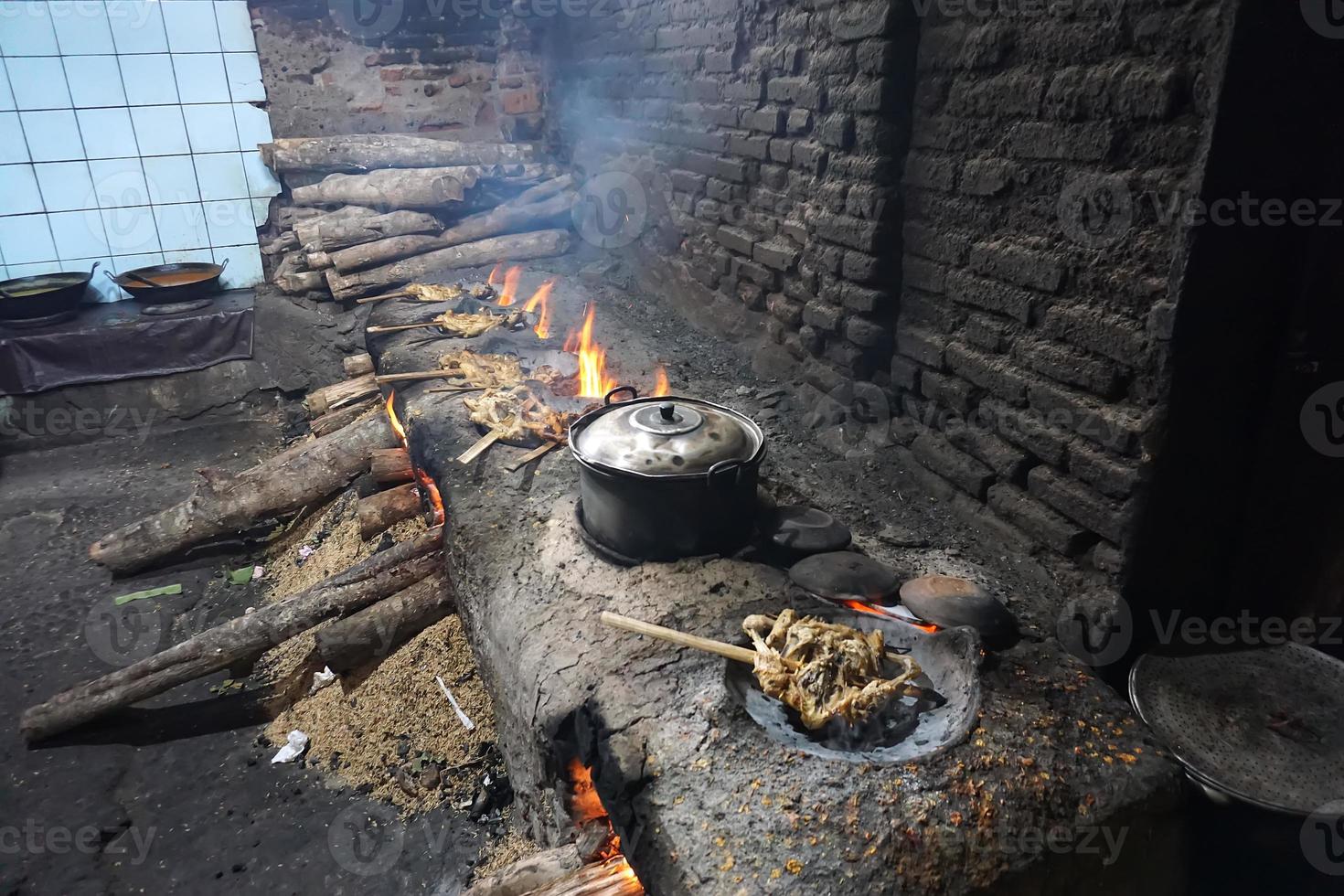 Grilled chicken with garlic seasoning cooked in the traditional photo