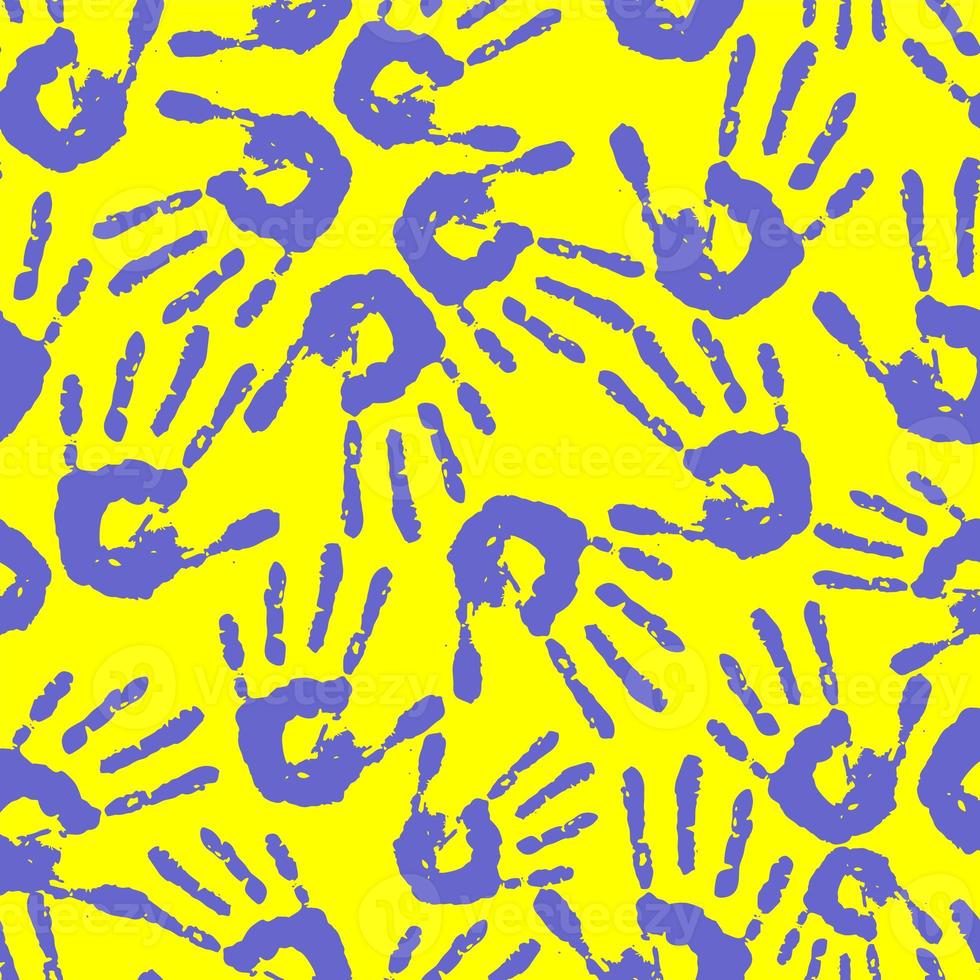 seamless pattern of blue handprints on a yellow background, texture, design photo