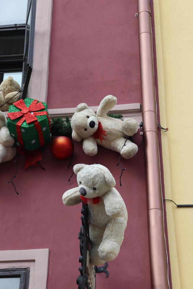 Hotel located in the center of Sighisoara that has a special facade.In this facade there are different models of teddy bears. photo