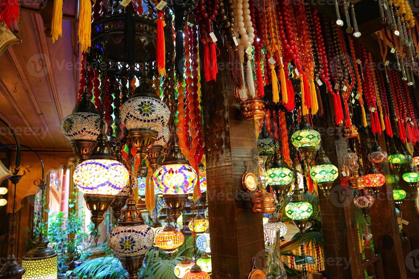 A bunch of traditional vintage turkish lamps in the gift shop at Turkey. photo