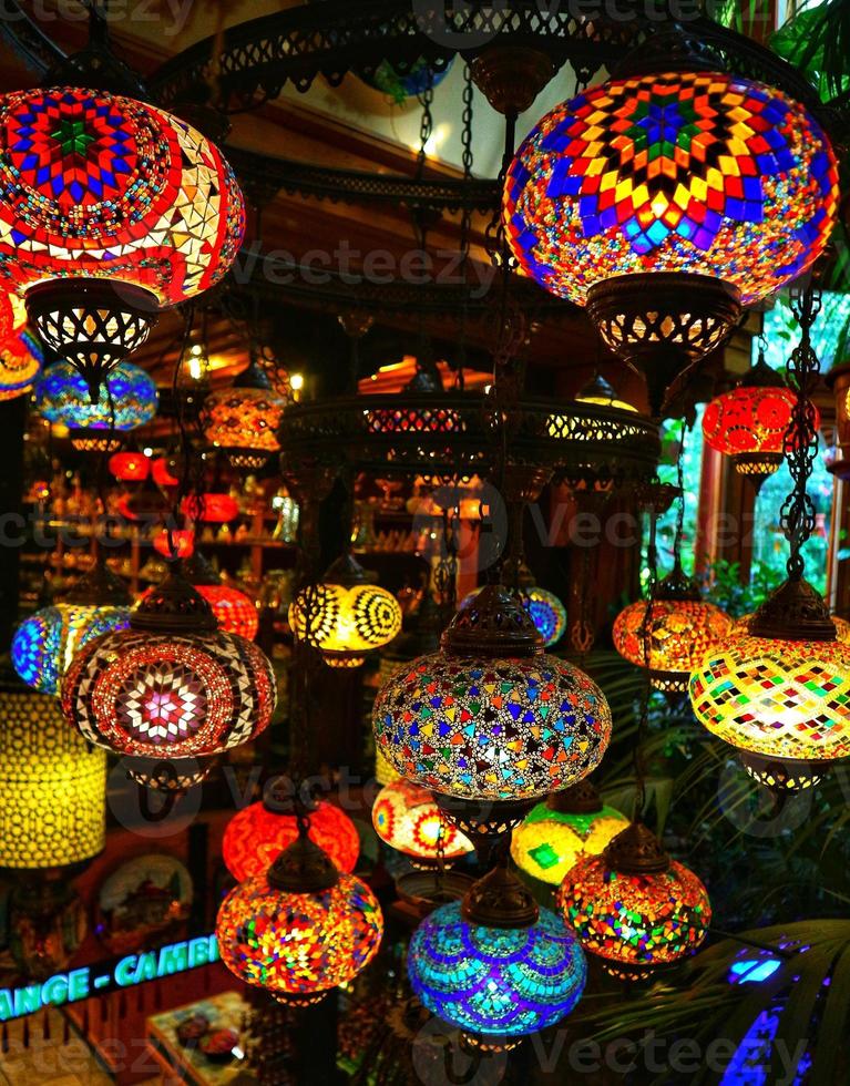 A bunch of traditional vintage turkish lamps in the gift shop at Turkey. photo