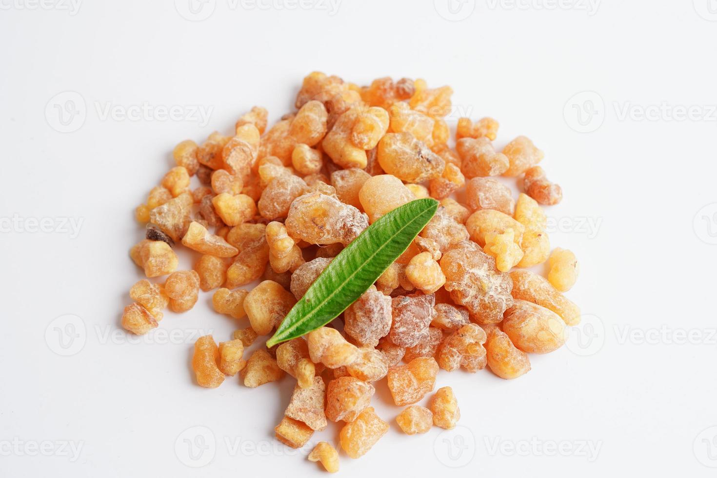 Frankincense or olibanum aromatic resin isolated on white background used in incense and perfumes. photo