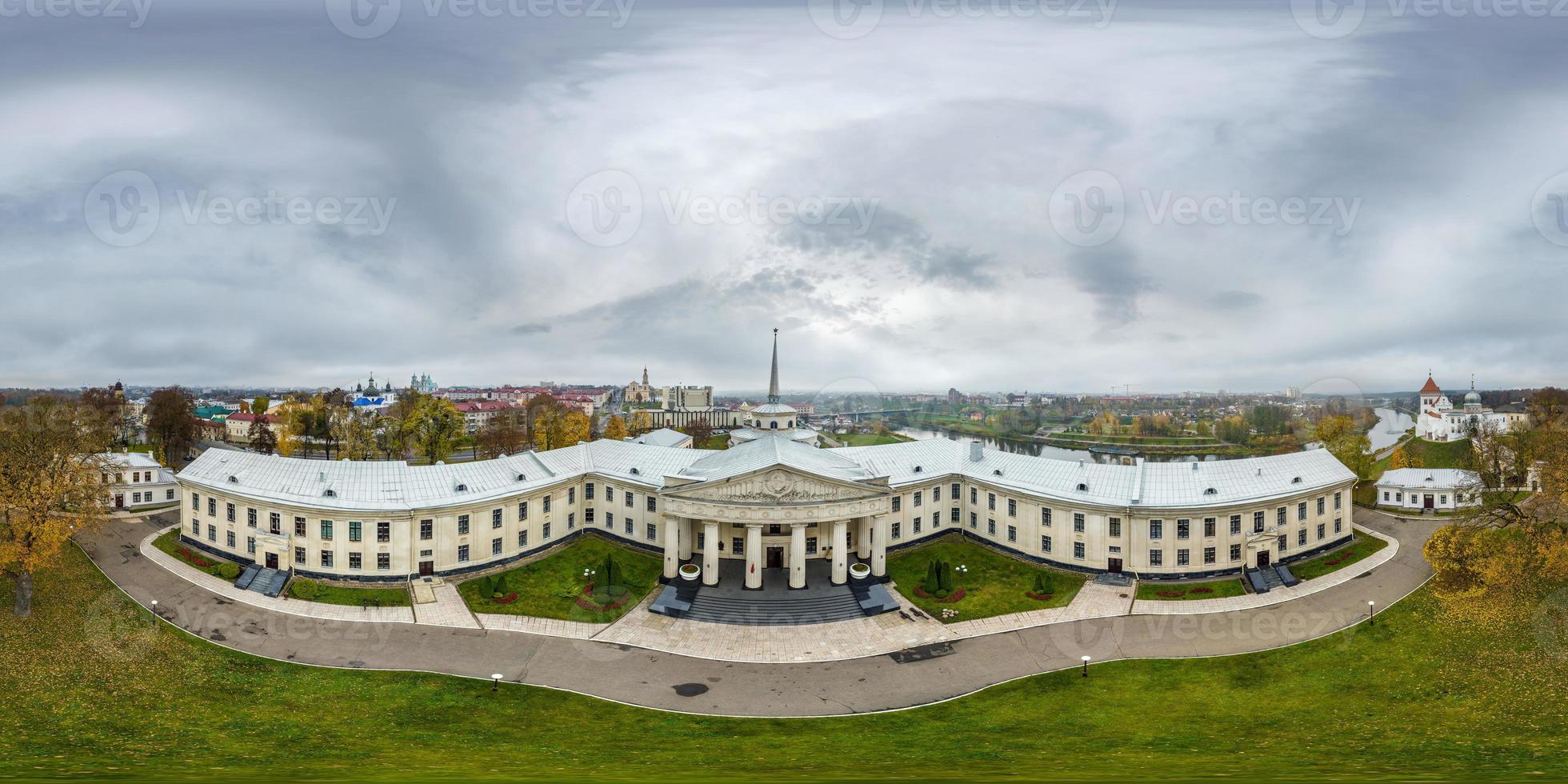 aerial full seamless spherical hdri 360 panorama view above over a medieval castle with columns and historic buildings in equirectangular projection. photo