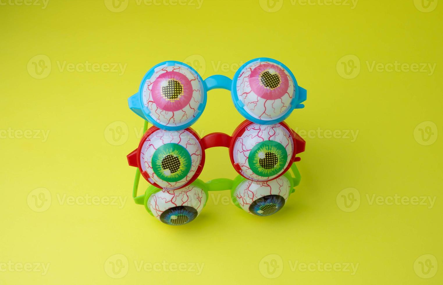 Funny Multicolored glasses with eyeballs for Halloween 17619964 Stock