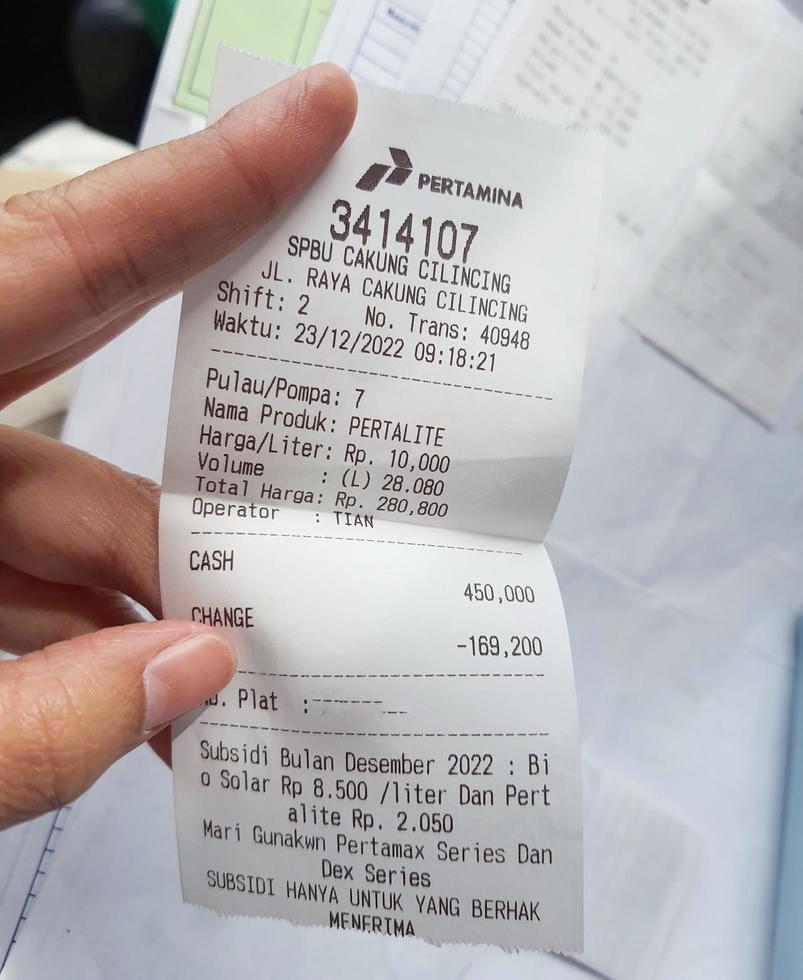 West java indonesia in january 2023 a hand is holding a fuel purchase