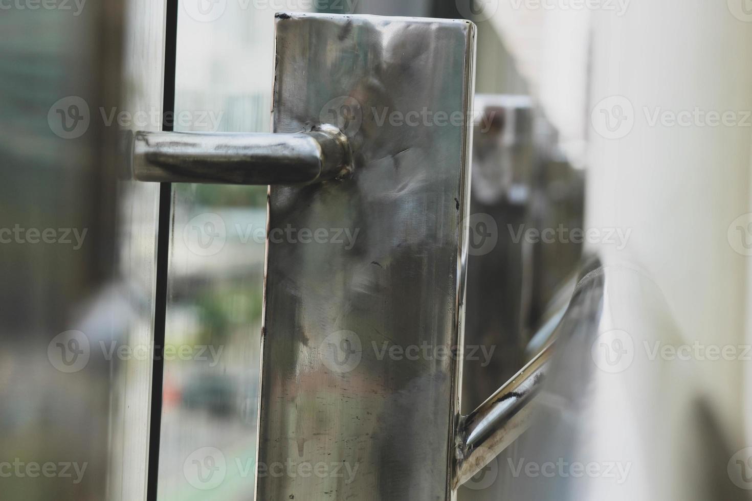 Steel trellis from a separator fence at a transjakarta busway stop. photo