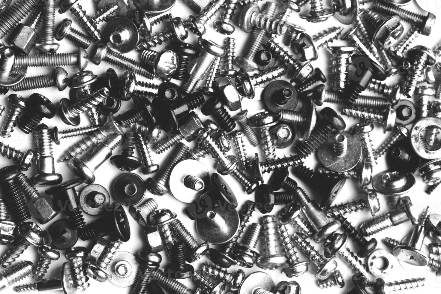 close up assortment many different bolts and screws photo