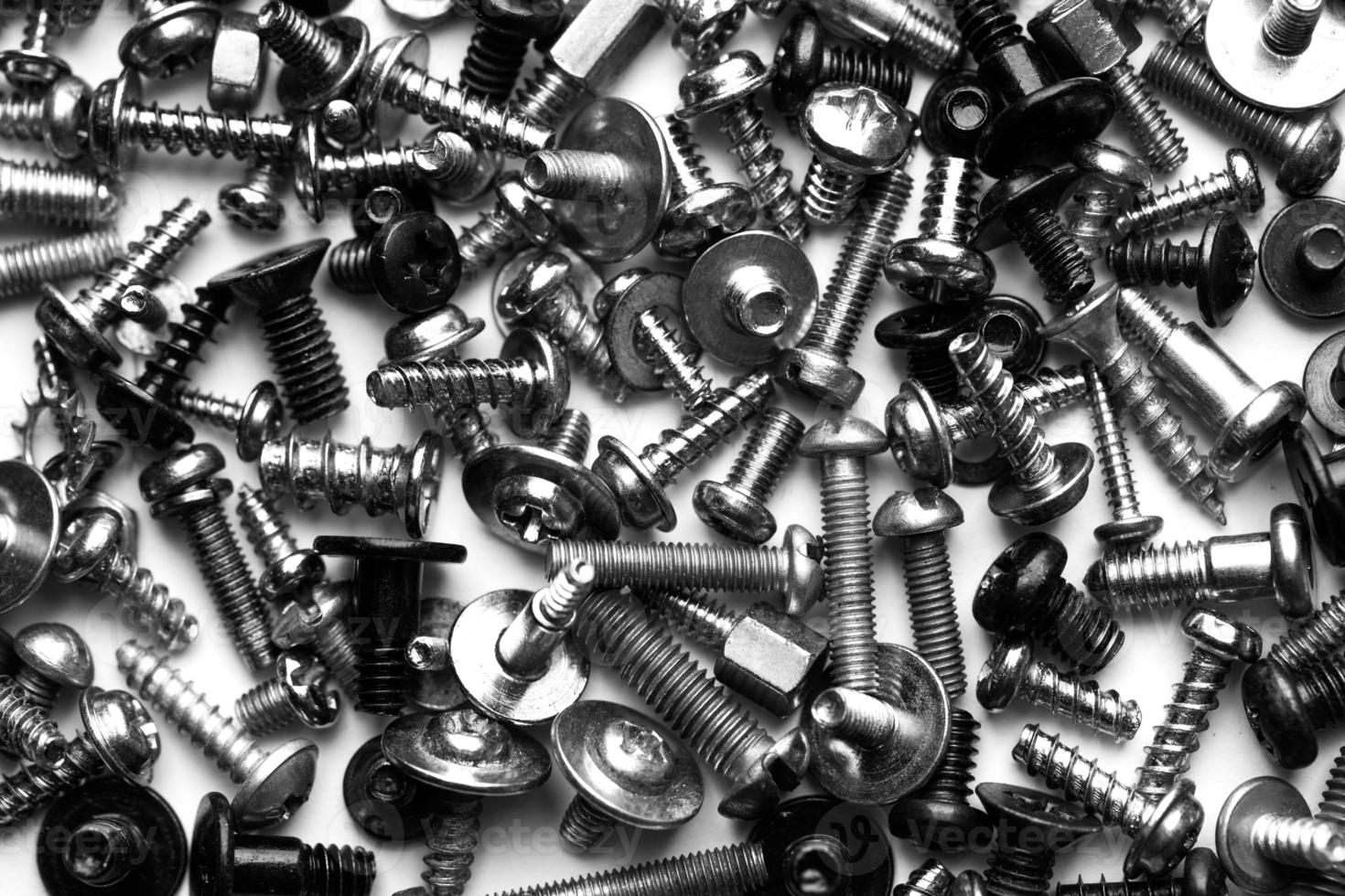 close up assortment many different bolts and screws photo