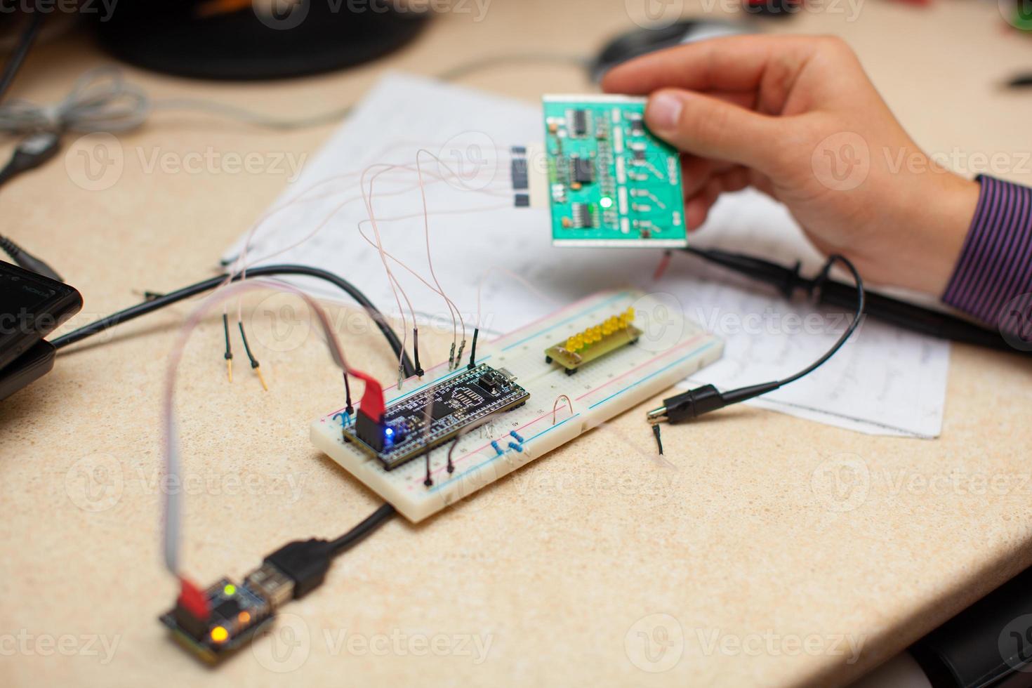 engineers work with electrical measuring devices photo