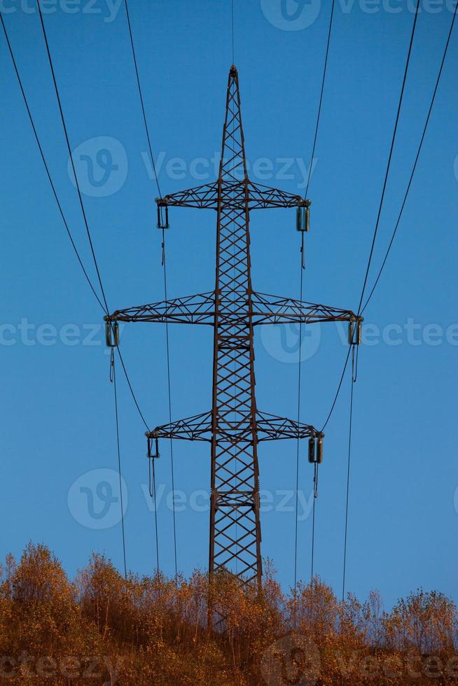 powerline, tower for transmission of current through wires photo