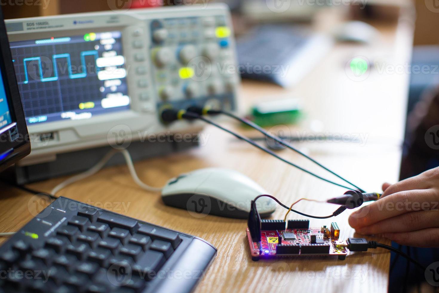 engineers work with electrical measuring devices photo