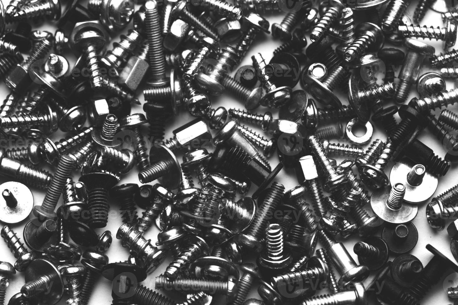 close up assortment many different bolts and screws photo