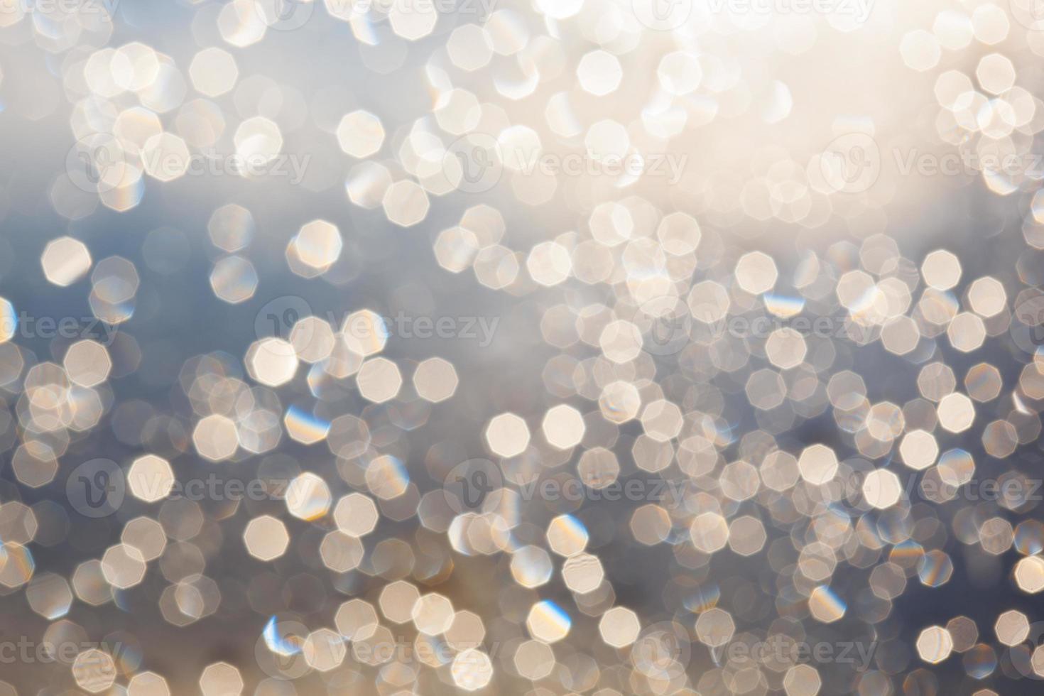 abstract blurred bokeh light with warm tone color background concept. photo