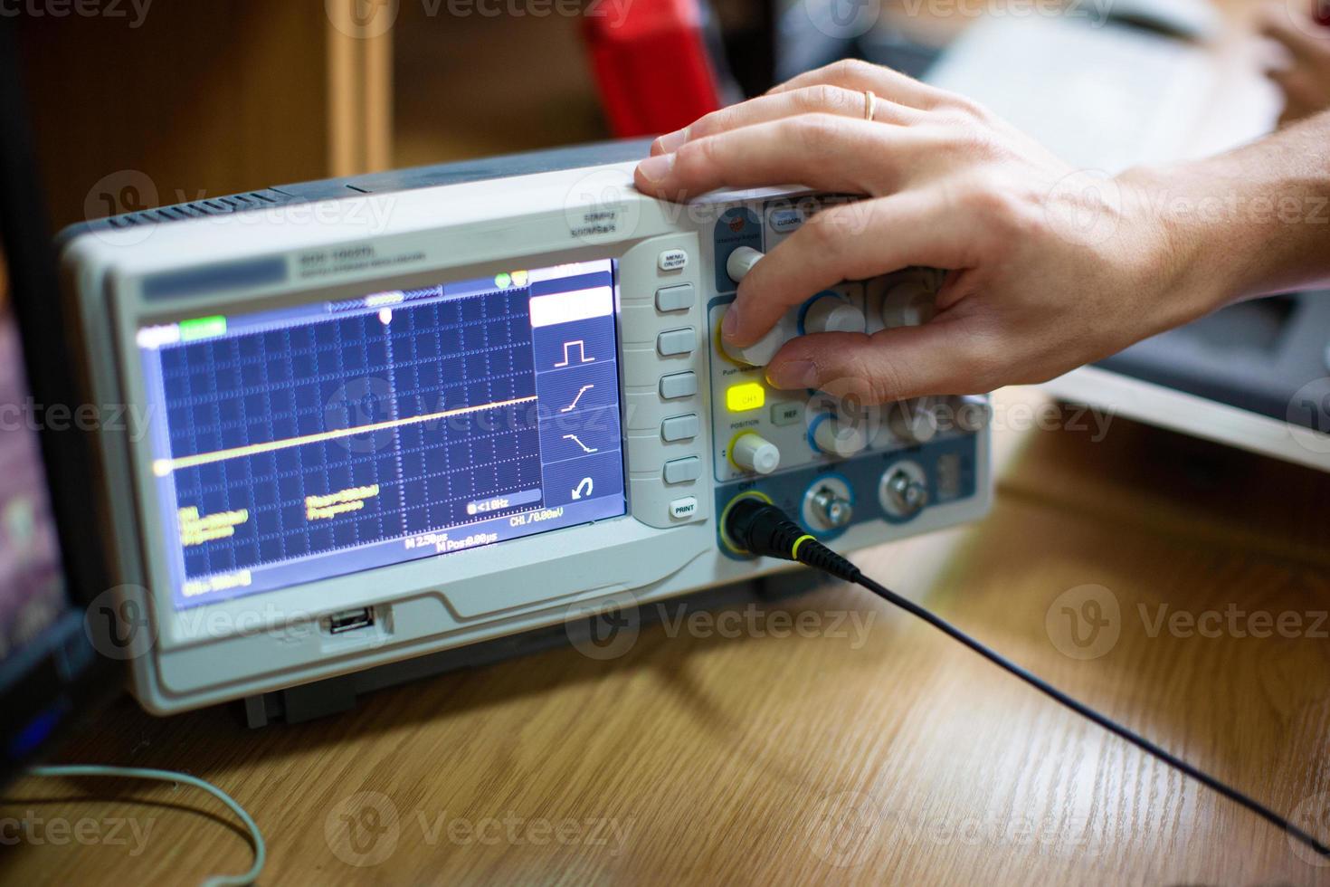 engineers work with electrical measuring devices photo