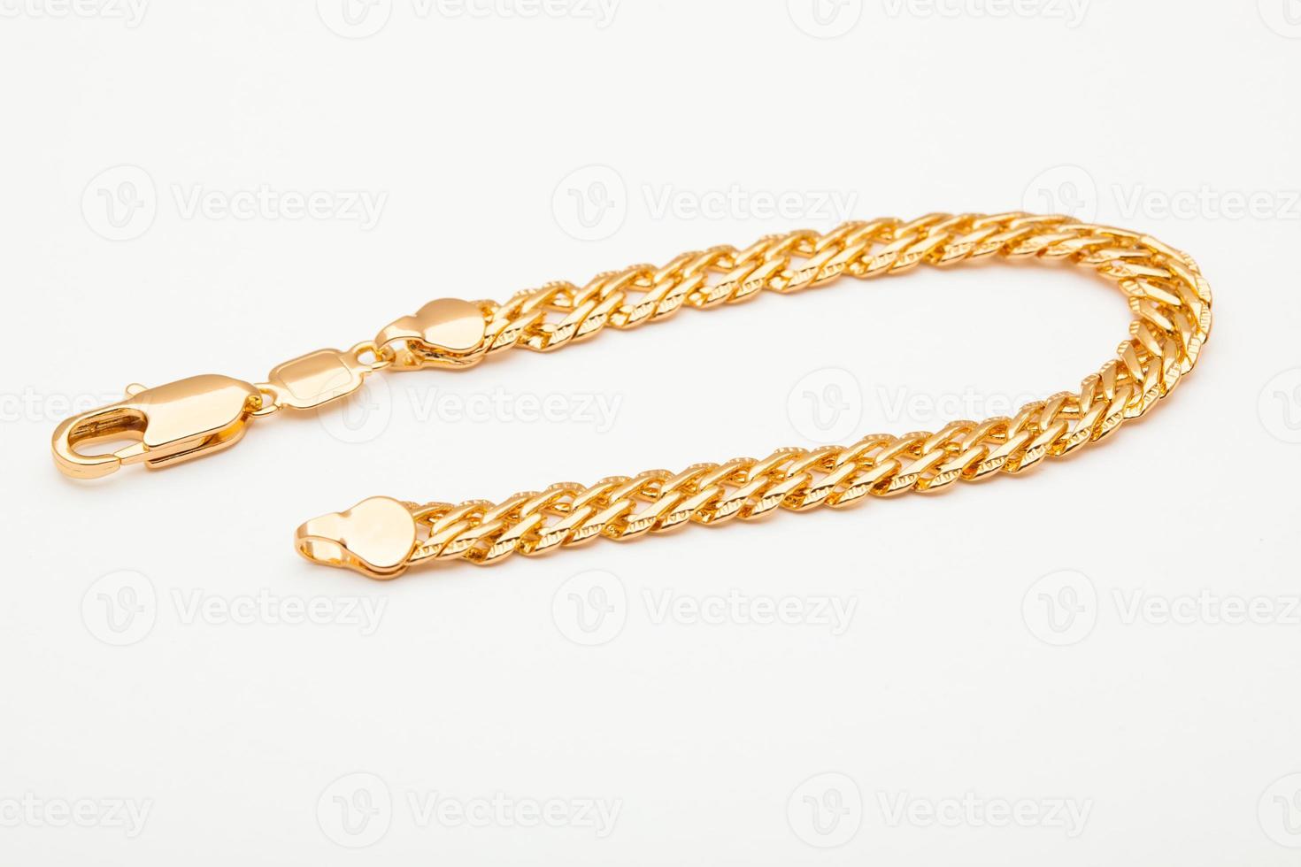 close-up gold bracelet jewelry, chain on hand photo