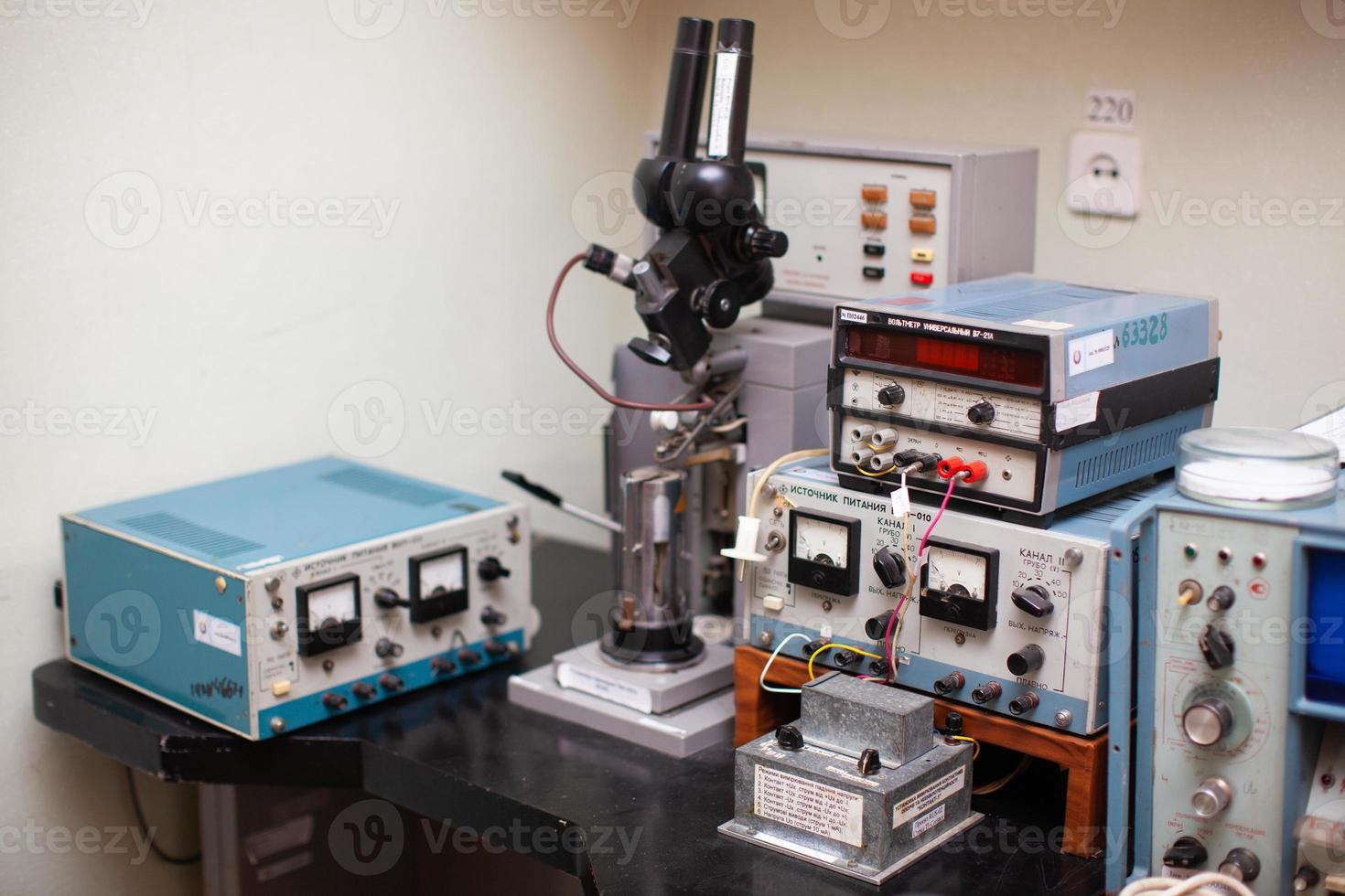 engineers work with electrical measuring devices photo