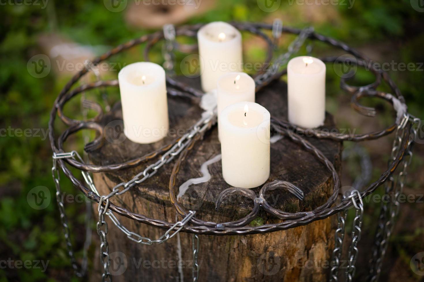 many candles on a stump photo