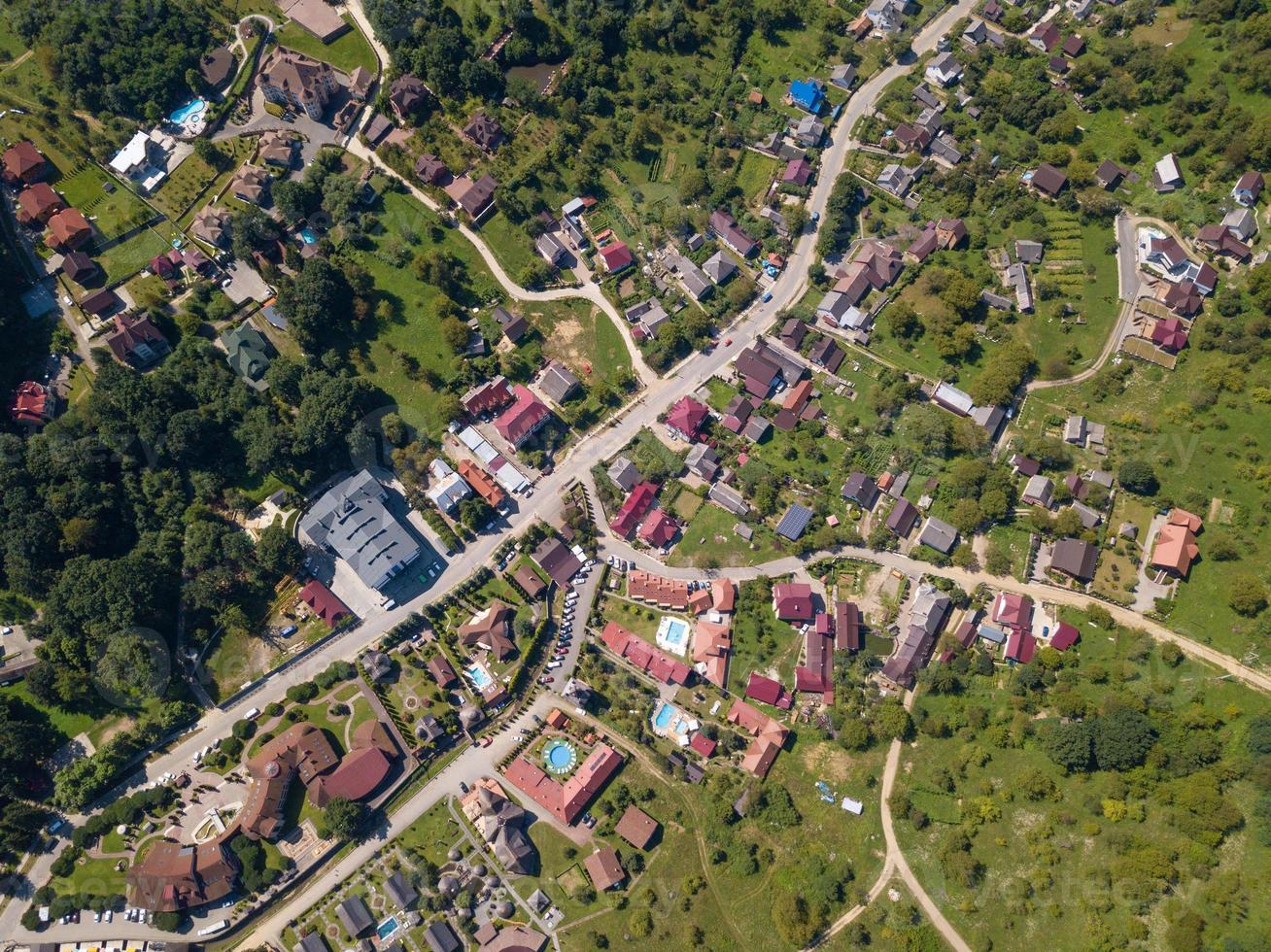 city in the middle of the mountains from a drone photo