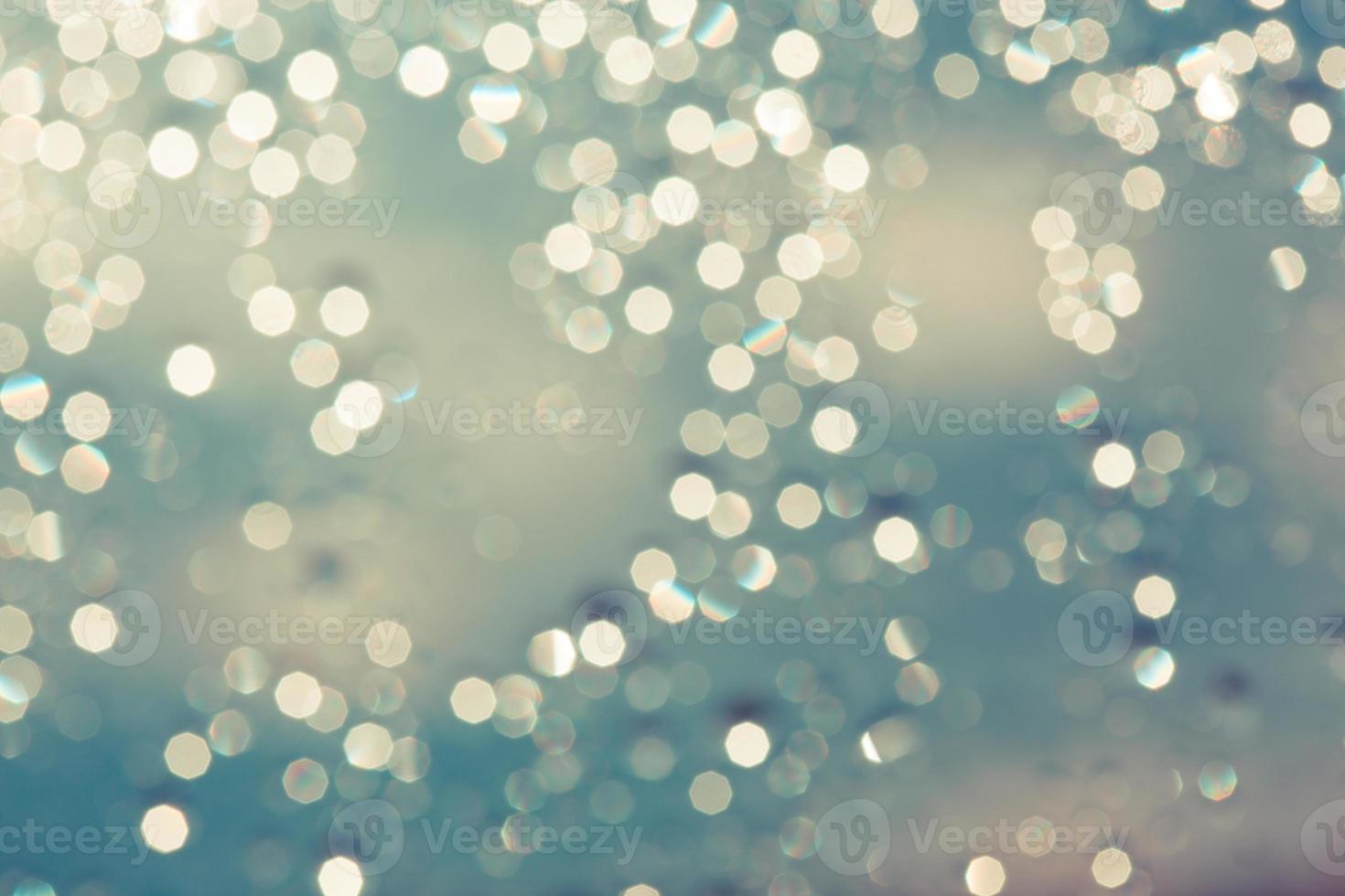 abstract blurred bokeh light with warm tone color background concept. photo