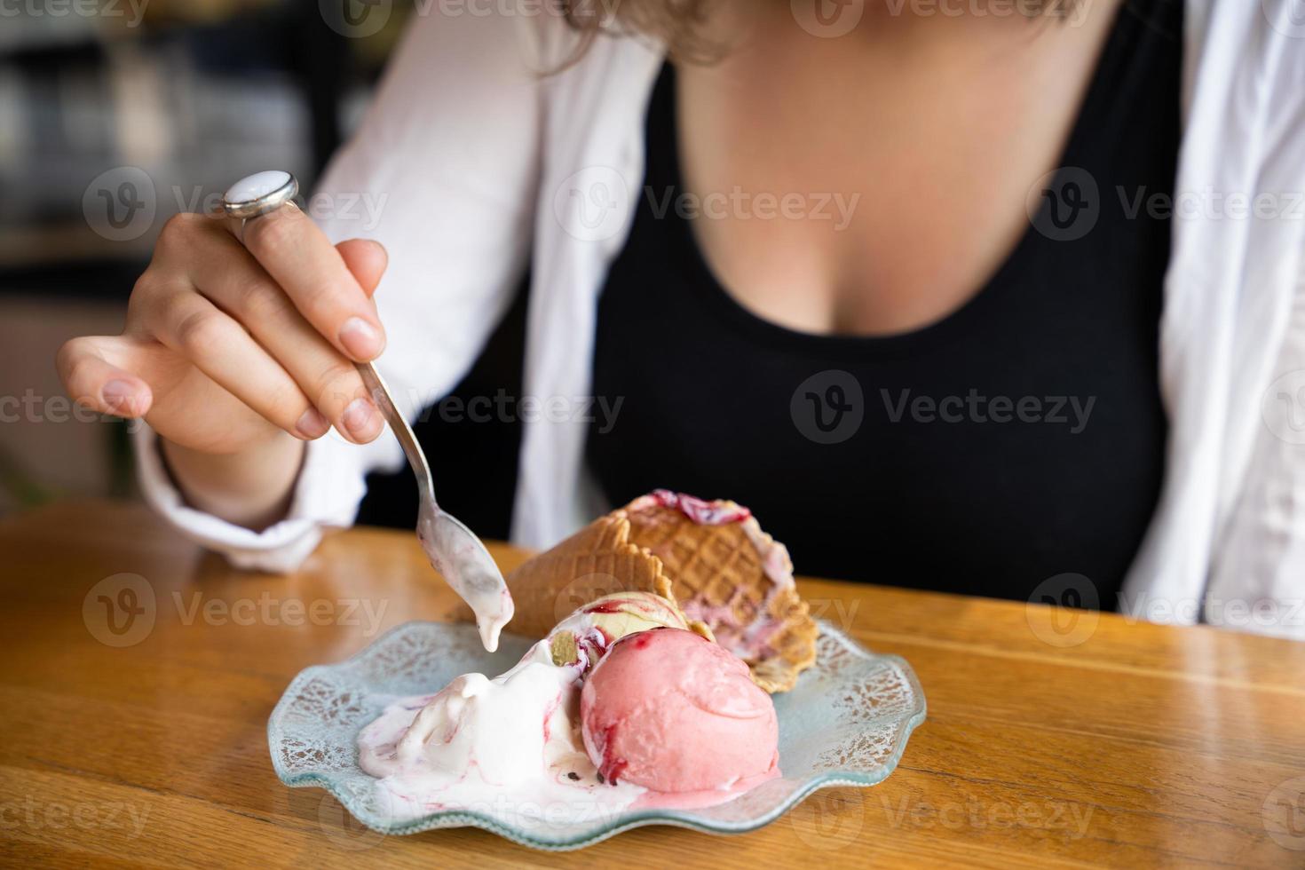 close-up of delicious ice cream in hands photo