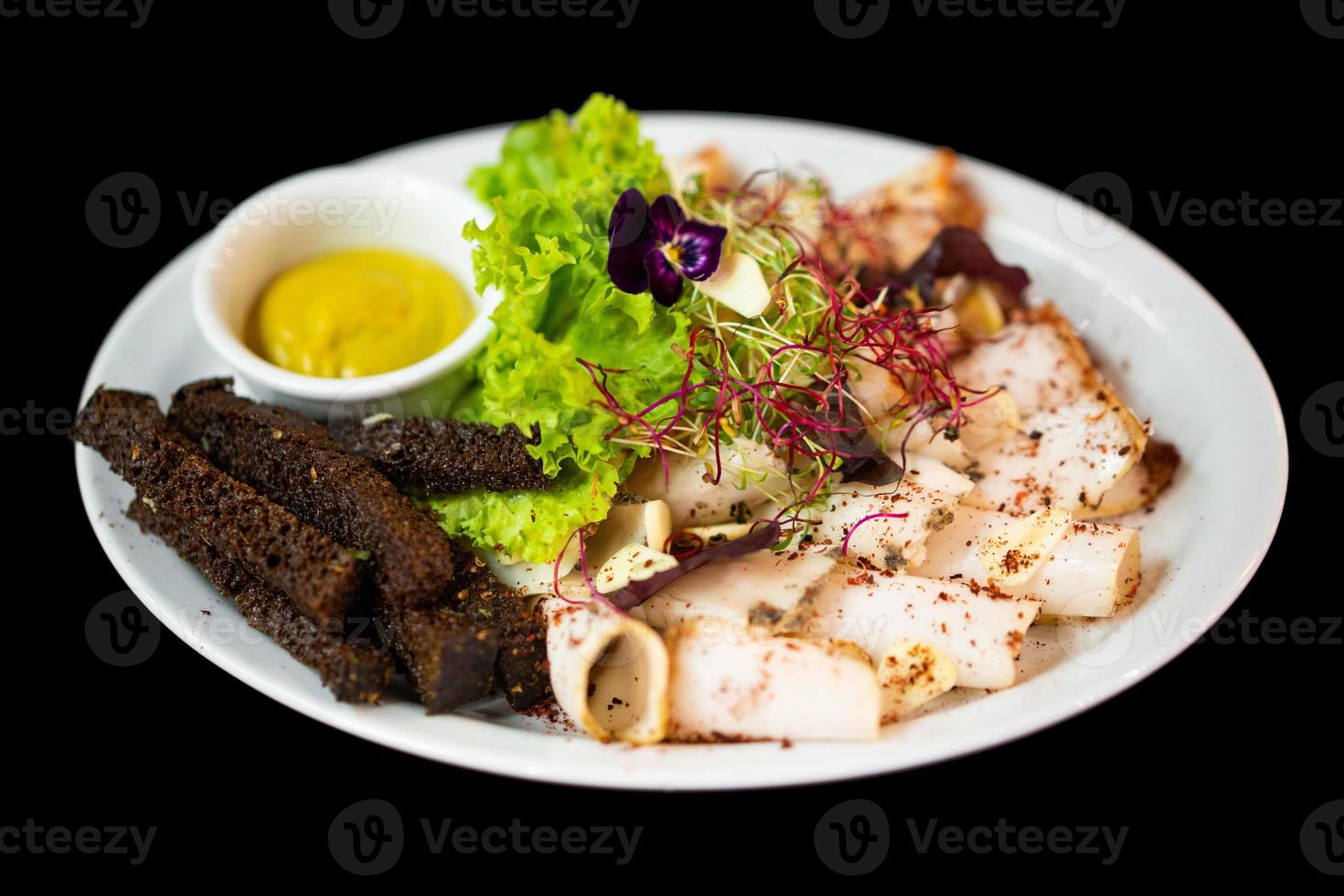 close up of a good serving from the chef slicing meat and snacks photo