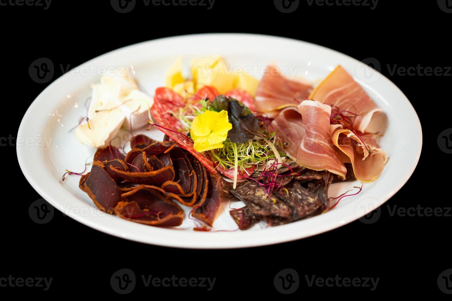 close up of a good serving from the chef slicing meat and snacks photo