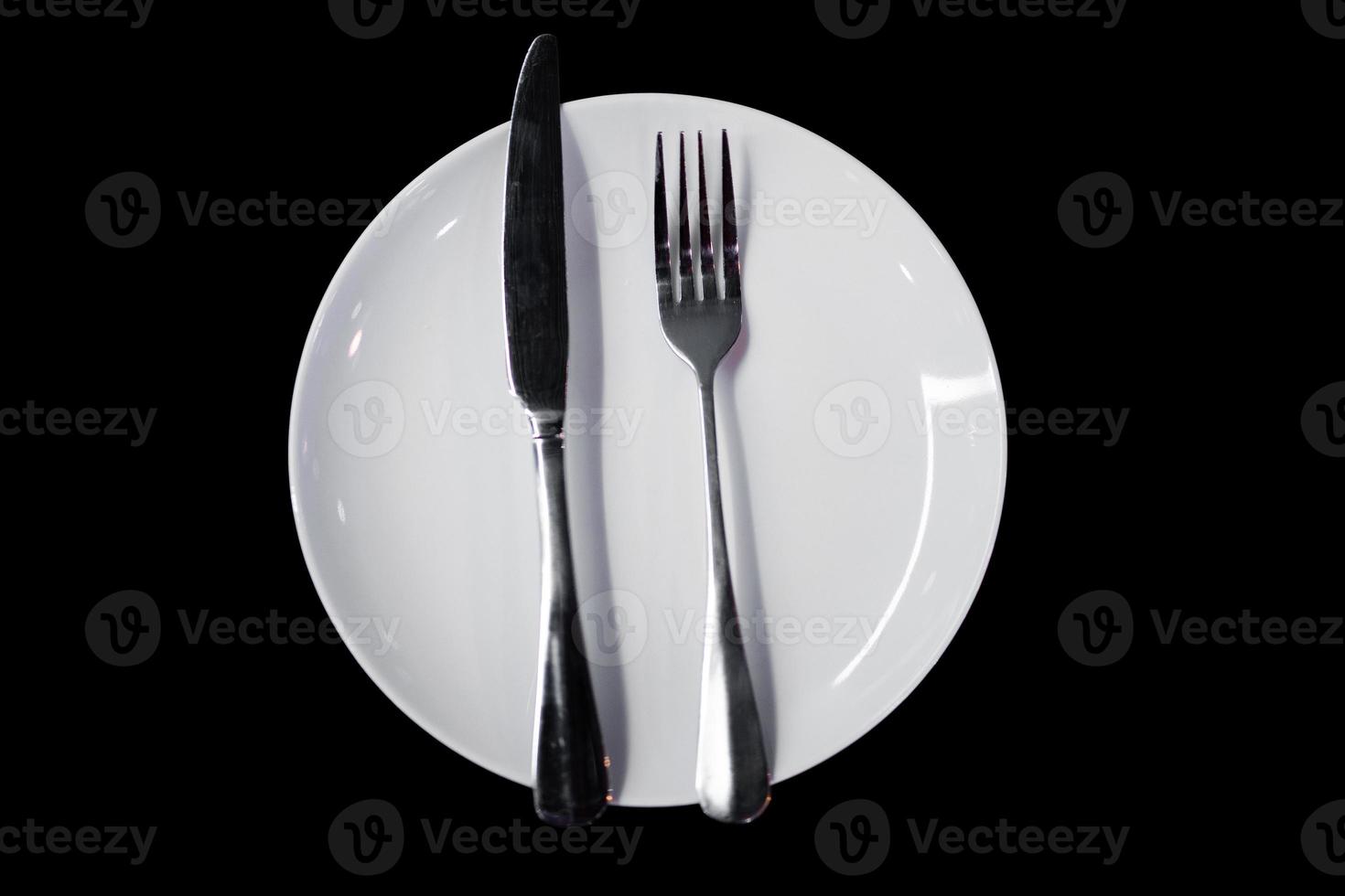 set of cutlery for dinner at the table photo