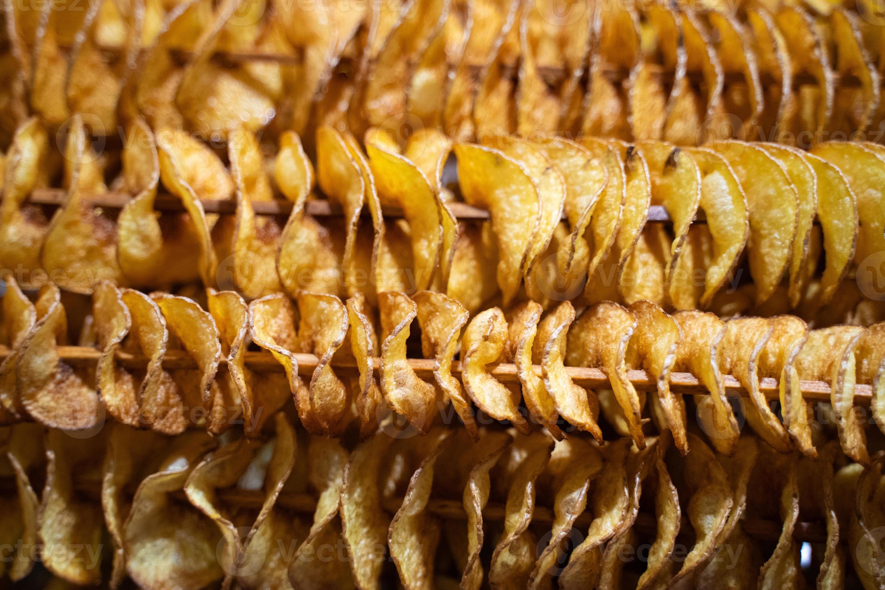 potato chips on a stick 17624068 Stock Photo at Vecteezy