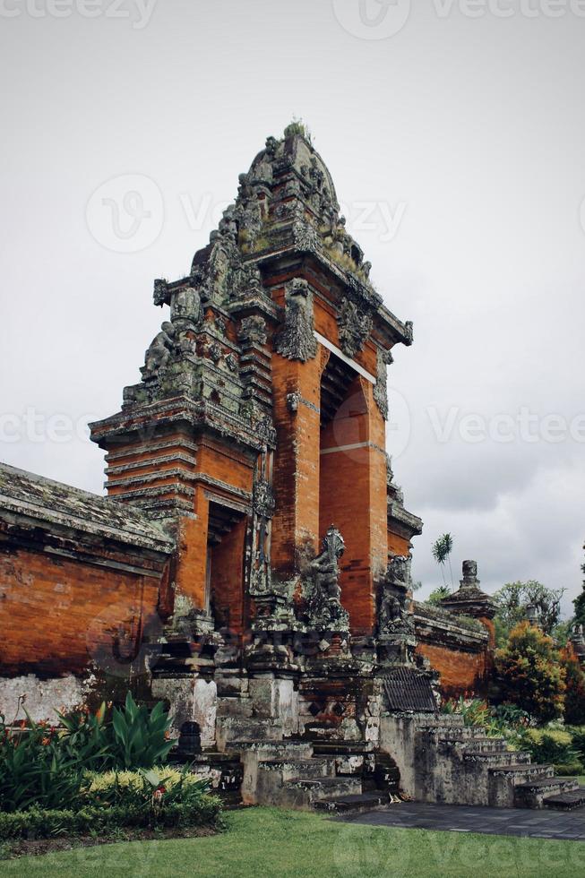 This is a temple entrance in Bali and contains full of Balinese carvings, the Balinese people usually call it Candi Bentar. photo