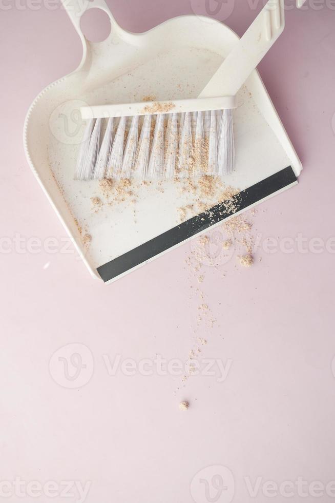 floor dust with dust pan close up , photo