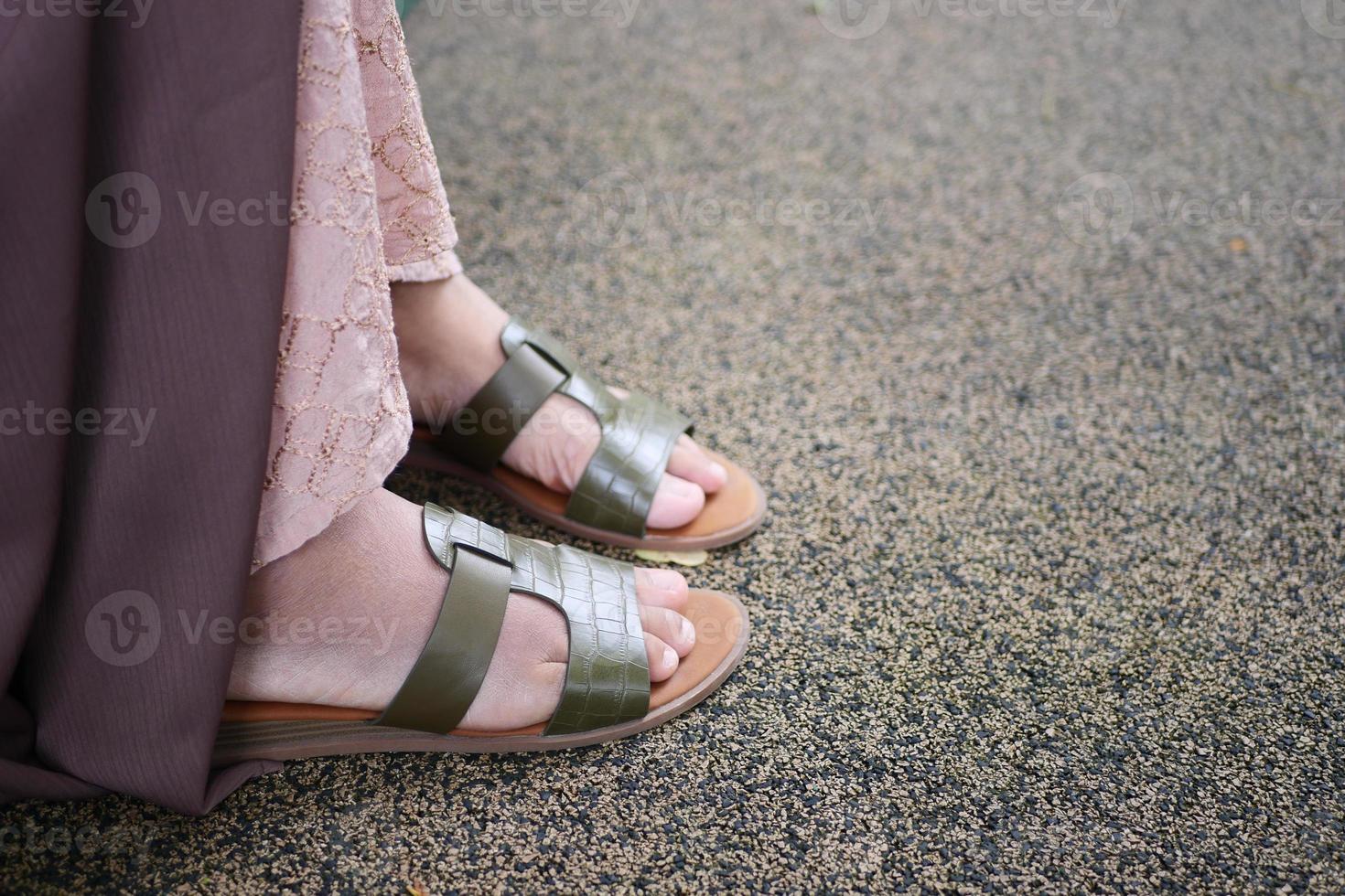 girls feet wearing sandal outdoor photo